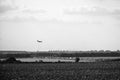 Hostivice, Czech republic - August 16, 2018: aeroplain above field and D6 highway leading to Vaclav Havel airport in Prague during