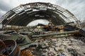 Detached tower of russian armored vehicle BMD-4 in the background of Mriya AN-225 destroyed on Hostomel airfield Royalty Free Stock Photo