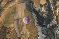 Hot air ballon and Colourful rock formations. Fairy Chimney or Multihead stone mushrooms. Phallic rock in Cappadocia, turkey. Royalty Free Stock Photo