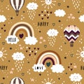 Hot air ballon, happy rainbows, clouds and sun seamless childish pattern. Hand drawn repeat pattern for wrapping, fabrik, textile