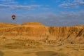 A hot air ballon over the Deir al-Bahari complex Royalty Free Stock Photo