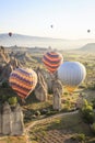 Hot air ballons over Love Valley near Goreme and Nevsehir in the center of Cappadocia, Turkey region of Anatolia. Royalty Free Stock Photo