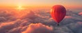 Hot air balloon above clouds at sunrise Royalty Free Stock Photo