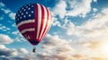 A hot air balloon, an airship flies in the clouds of the sky in the color of the flag of the United States of America. Royalty Free Stock Photo