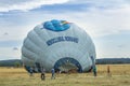 Hot air balloon at the aviation rally, Stanesti aerodrome, Gorj, Romania. The crew prepares to inflate the balloon