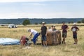 Hot air balloon at the aviation rally, Stanesti aerodrome, Gorj, Romania. The crew prepares to inflate the balloon