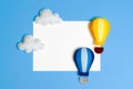 Hot air balloon in blue sky with clouds, frame, copyspace. Hand made felt toys. Royalty Free Stock Photo