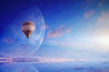 Hot air balloon in blue sky with rising full moon Royalty Free Stock Photo