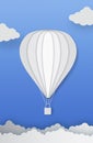 Hot air balloon and clouds on blue background Royalty Free Stock Photo