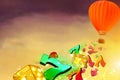 Hot air balloon with dice, luky sevens and baloons flying from Royalty Free Stock Photo