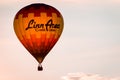 Hot air balloon floating by during a beautiful sunset in Michigan