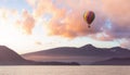 Hot Air Balloon flying over Canadian Mountain Nature Landscape on the Pacific West Coast