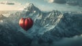 Hot Air Balloon Flying Over Mountain Range