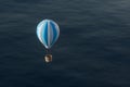 Hot air balloon flying over the ocean, 3d rendering Royalty Free Stock Photo