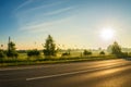 Hot air balloon flying over the road Royalty Free Stock Photo