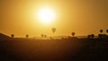 Hot air balloon flying over rock landscape at Cappadocia Turkey Royalty Free Stock Photo