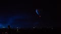 Hot air balloon flying over spectacular Cappadocia under the sky with milky way and shininng star at night with grain Royalty Free Stock Photo