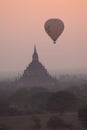 Hot Air Balloon Flying Through Pagoda