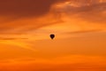 Hot air balloon flying at sunset sky Royalty Free Stock Photo