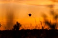 Hot air balloon flying at sunset sky Royalty Free Stock Photo