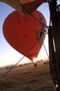 Hot air balloon gets ready to take off with high flame