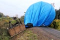 Hot air balloon laid over the road