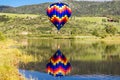 Hot Air Balloon with Lake Reflection Royalty Free Stock Photo