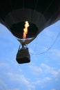 Hot Air Balloon lifting off in the evening Royalty Free Stock Photo