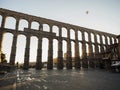 Hot air balloon over Aqueduct of Segovia roman architecture stone rock arch viaduct bridge in Castile and Leon Spain Royalty Free Stock Photo