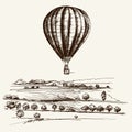 Hot air balloon over the field.