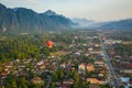 Hot air balloon over Nam Song river at sunrise in Vang vieng, Laos. Asia Royalty Free Stock Photo