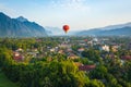 Hot air balloon over Nam Song river at sunrise in Vang vieng, Laos. Asia Royalty Free Stock Photo