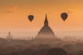 Hot air balloon over plain of Bagan in misty morning, Myanmar Royalty Free Stock Photo