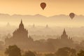 Hot air balloon over plain of Bagan in misty morning, Myanmar Royalty Free Stock Photo