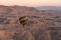 Hot air Balloon over Valley of the King in Luxor city in a beautiful morning sunrise, Upper Egypt Royalty Free Stock Photo