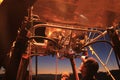 Hot Air Balloon Pilot checks flame burner