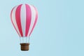 Hot air balloon pink white stripes, colorful balloon on a blue background. 3d render Royalty Free Stock Photo