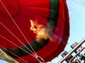 Hot air balloon with flaming burners Royalty Free Stock Photo