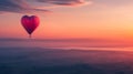 Hot air balloon in the shape of heart against the background of a beautiful landscape