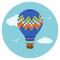 Hot air balloon in the sky with clouds. Flat design