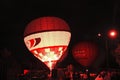 Hot air balloon starting to fly in evening sky