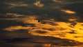 Hot air balloon in the Sunset with dramatic clouds and colors