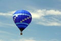 Hot air balloon tethered to ground