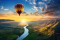 Hot air balloon flying over the beautiful nature and the creek