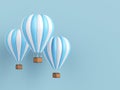 Hot air balloon white and blue stripes, colorful aerostat on blue background. 3d render Royalty Free Stock Photo