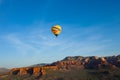 Hot air ballooning over sedona Arizona showing balloon and butte Royalty Free Stock Photo