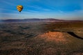 Hot air ballooning over sedona Arizona showing balloon and butte Royalty Free Stock Photo