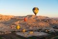 Hot air Balloons above Valley of the King in Luxor city in a morning, Upper Egypt Royalty Free Stock Photo