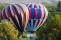 Hot Air Balloons Being Inflated to Prepare for an Early Morning Launch