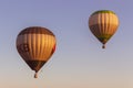 Hot air balloons in clear blue sky. Colorful balloon with basket lift up. Aircraft concept. Summer adventure and leisure.